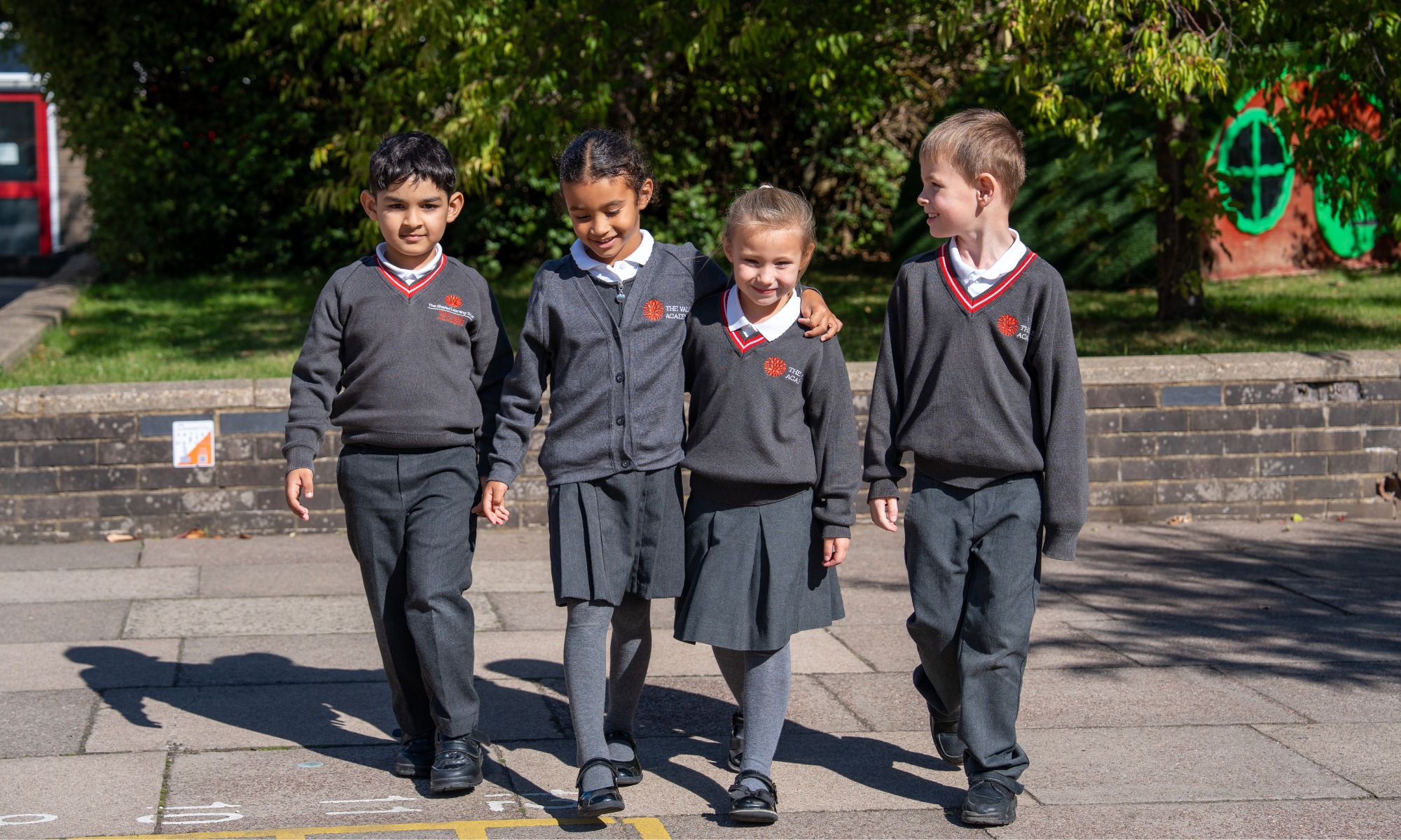 Four vale students walking
