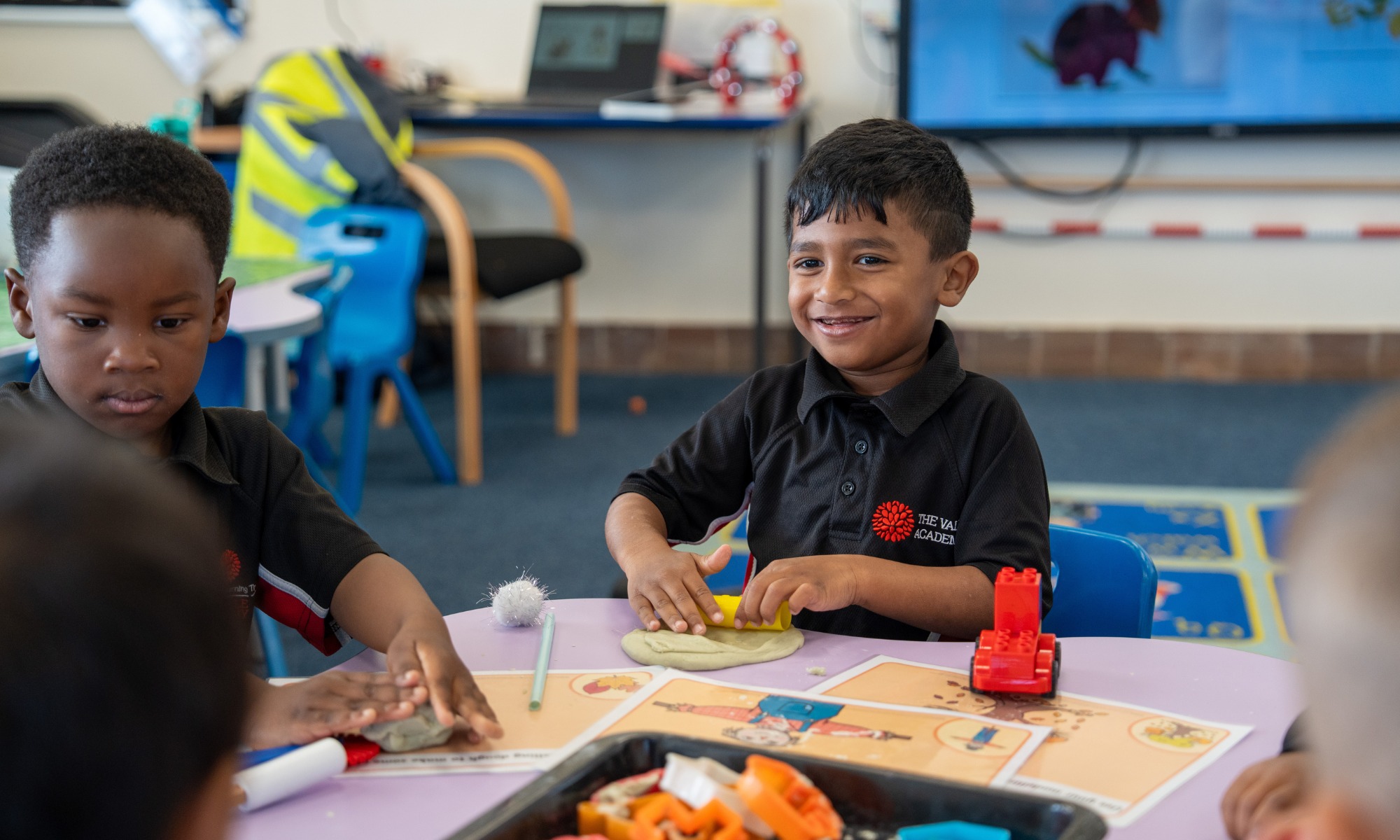 Vale student with playdough